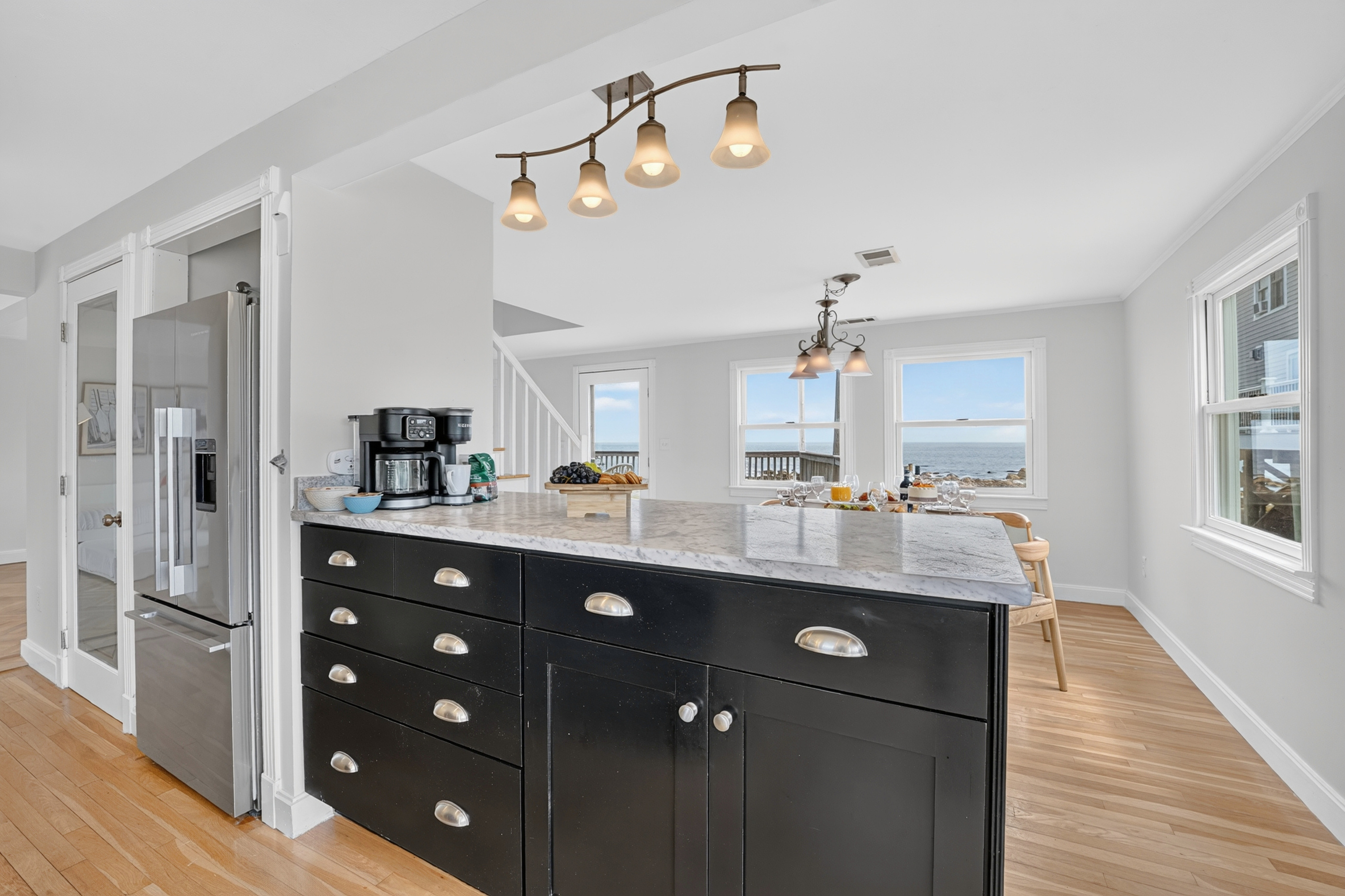 Bright, open kitchen with generous counter space and an island that makes meal prep easy.