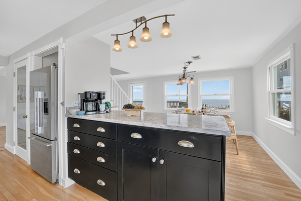 Bright, open kitchen with generous counter space and an island that makes meal prep easy.