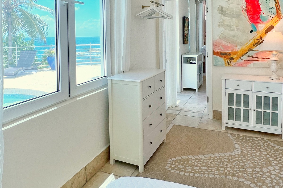 Take in gentle breezes from Bedroom&rsquo;s outdoor sitting area.