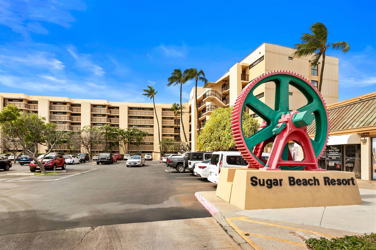 Welcome to Sugar Beach Resort. Complimentary parking, this is the entry you want to park at for best access to the condo