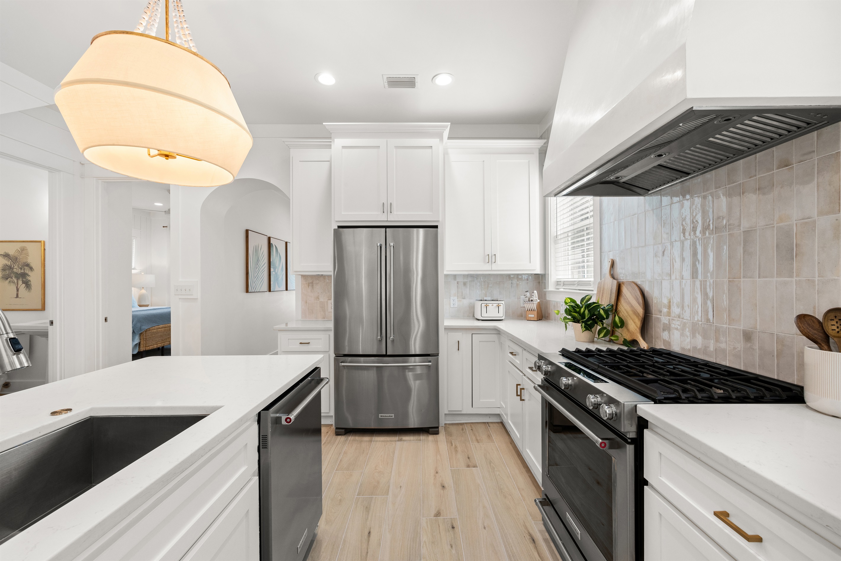 Clean lines, modern finishes, and plenty of workspace make meal prep easy—though with so many great restaurants nearby, you may not cook as much as you planned.