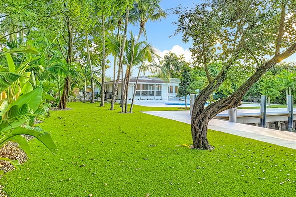 Lots of different areas for kids to play. The pool and dock fence (not shown) can be put up if there will be young children. 