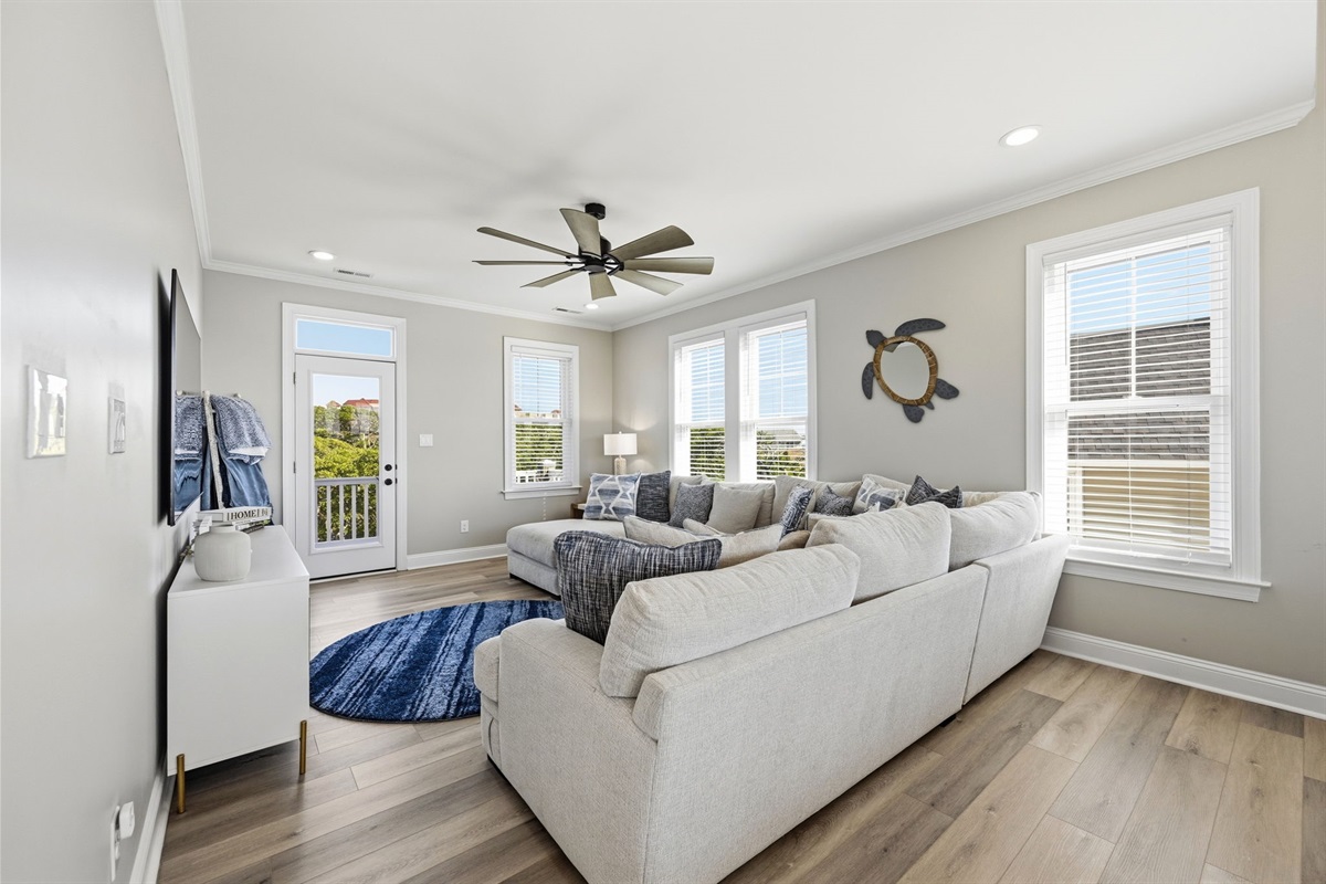 The top-level lounge at Breeze on the Bay is the perfect spot to unwind after a beach day