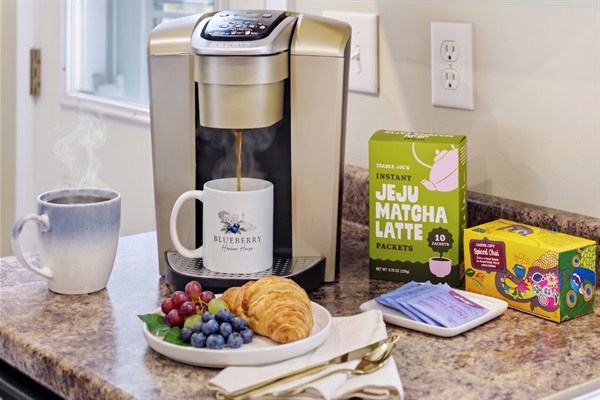 A cozy coffee setup inviting you to slow down and enjoy a fresh brew in a warm and relaxing atmosphere.