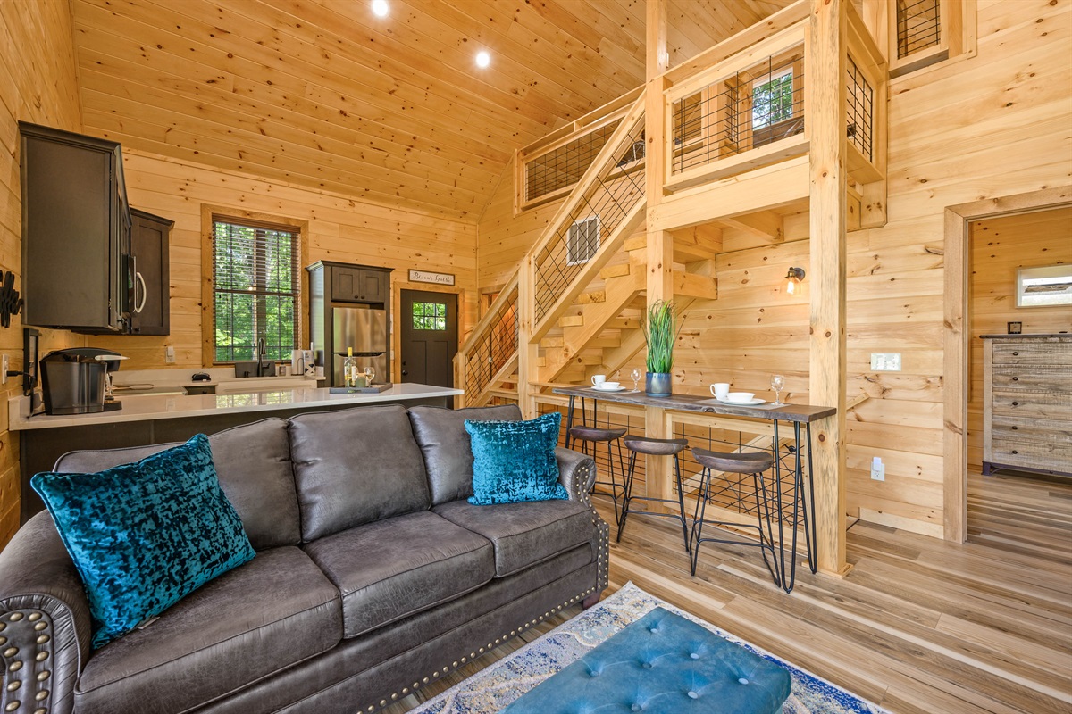 Juniper cottage living room with loft view