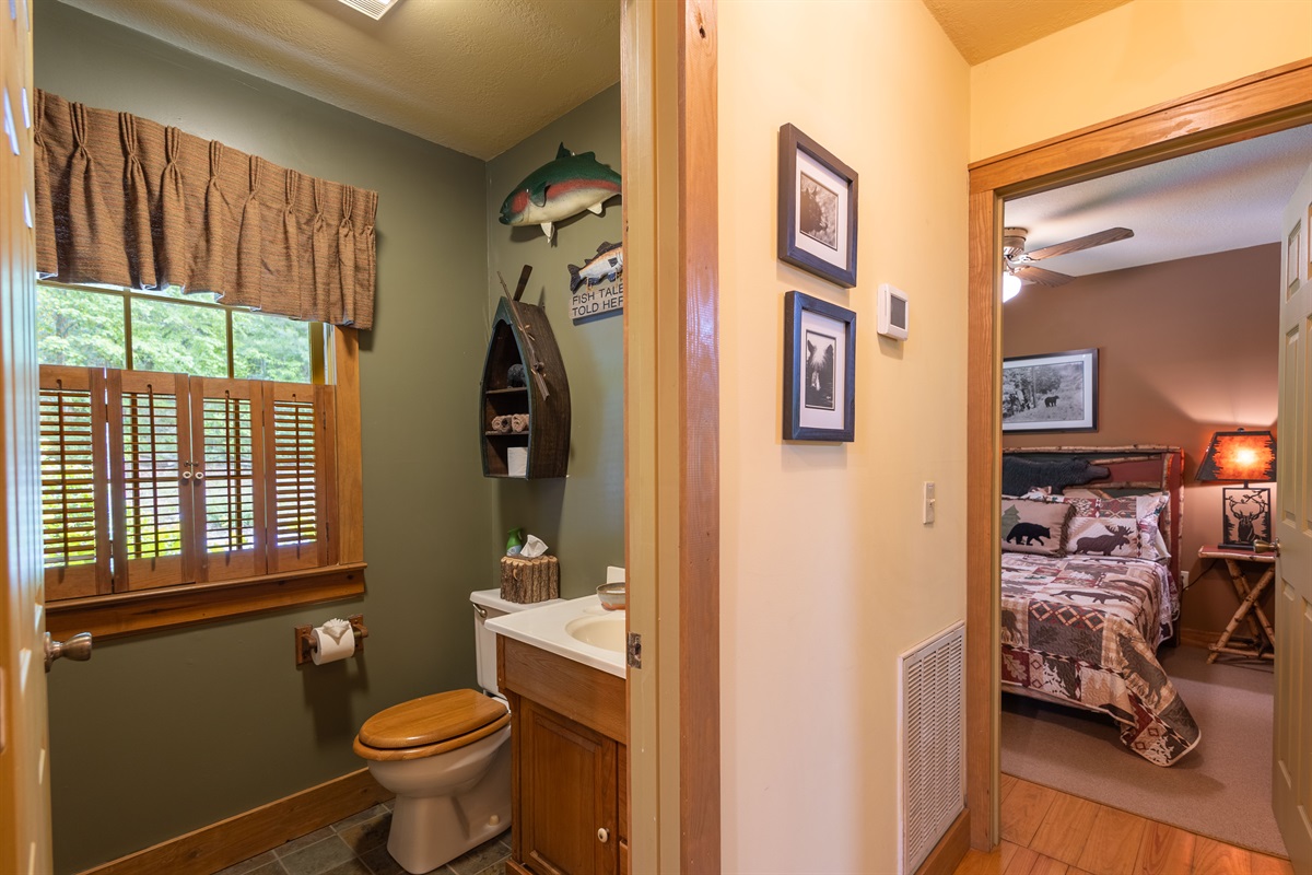 The hallway connects the full bathroom and second bedroom, offering an easy and comfortable layout for guests.