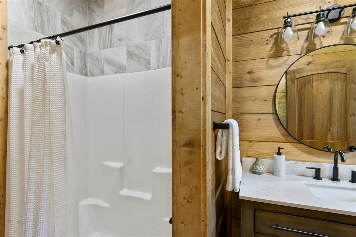 A bathroom that pampers—from rainfall showers to luxury details in every corner.