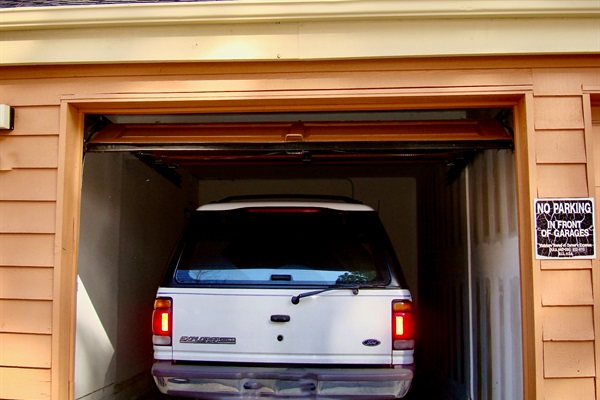 Convenient garage accommodates small and narrow vehicles.