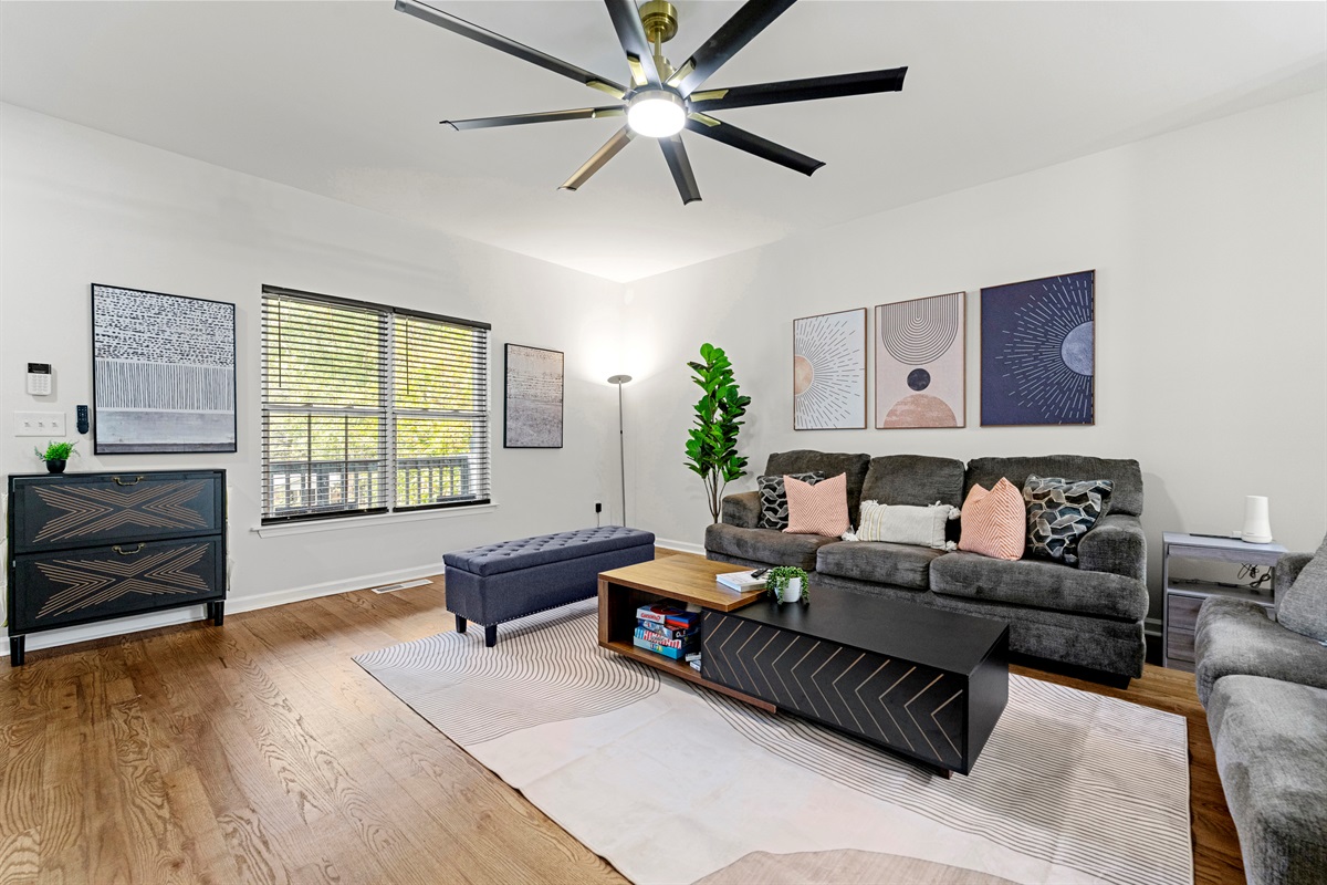 Kick back in the bright and stylish living room—perfect for movie nights or lazy mornings.