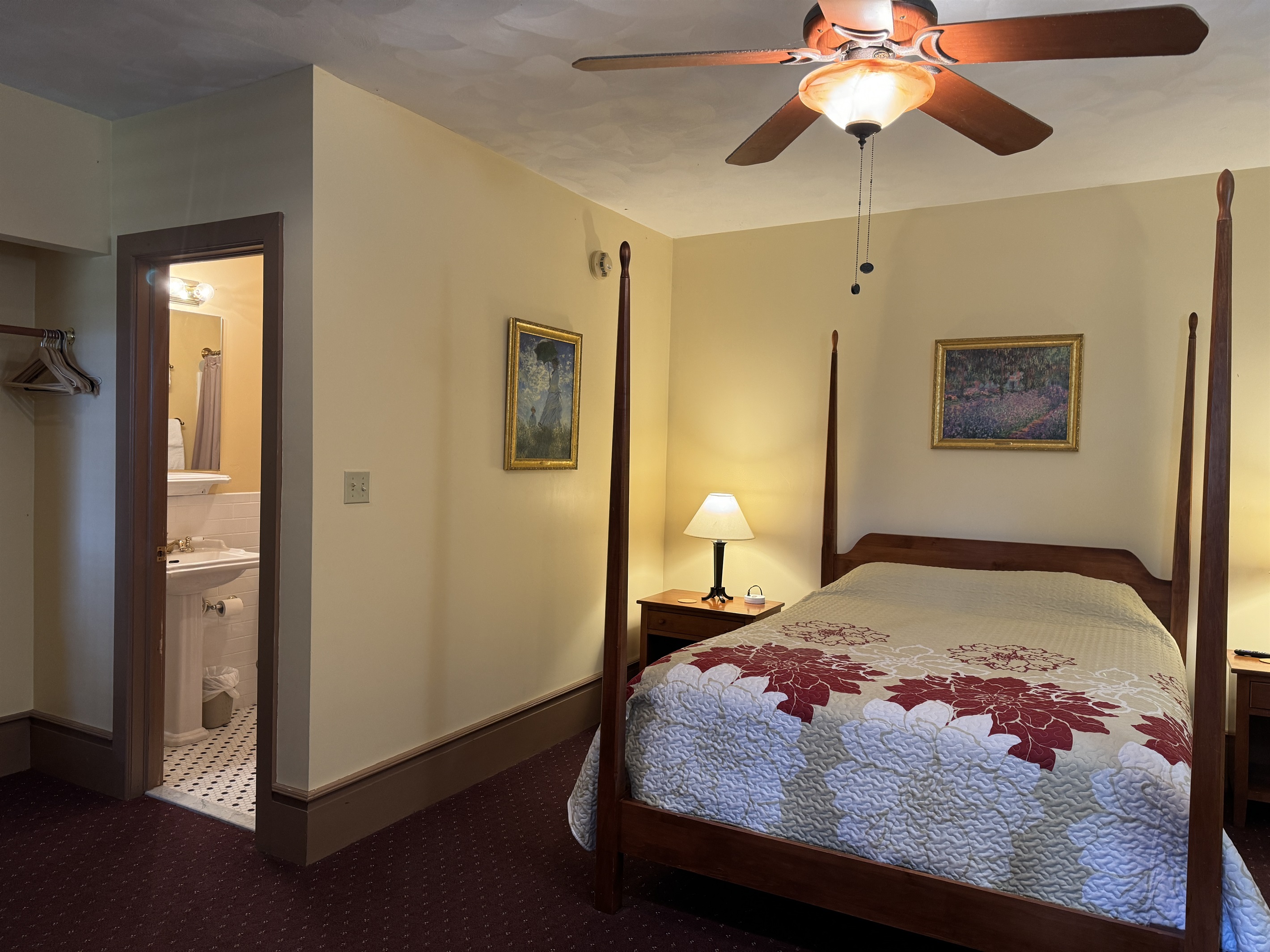 Guest room #1 with 1 Queen bed and ensuite full bathroom.