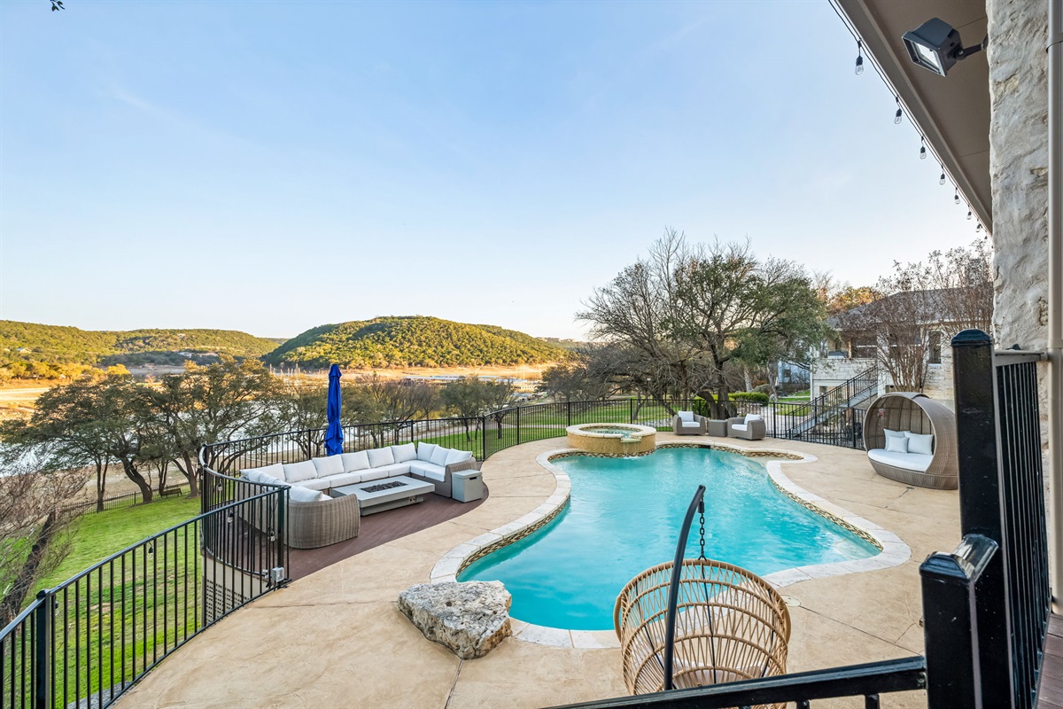 Resort-style pool and spa with breathtaking elevated lake views.