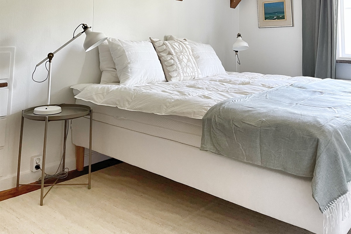 Both bedrooms have been renovated recently and have double beds with new mattresses (2025), wardrobe and washbasin