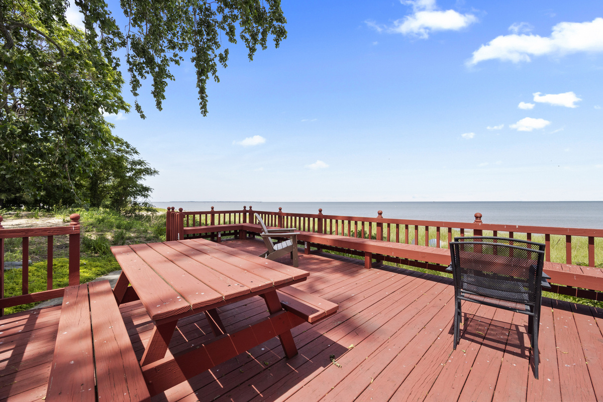 Deck overlooking the private beach and Lake Erie