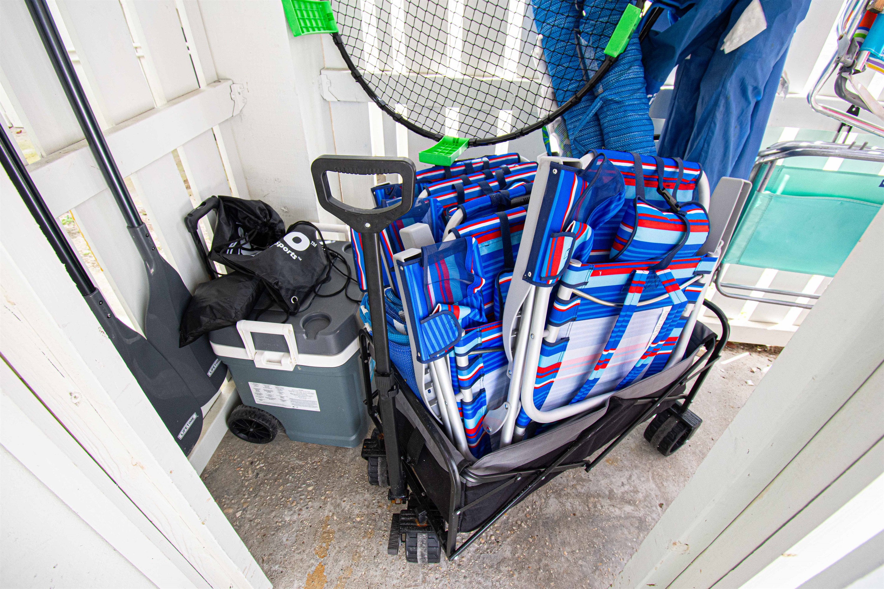 Beach gear is stored downstairs in the carport closet. No mess brought into the house, plus you can rinse the salt off in the shower or water hose.