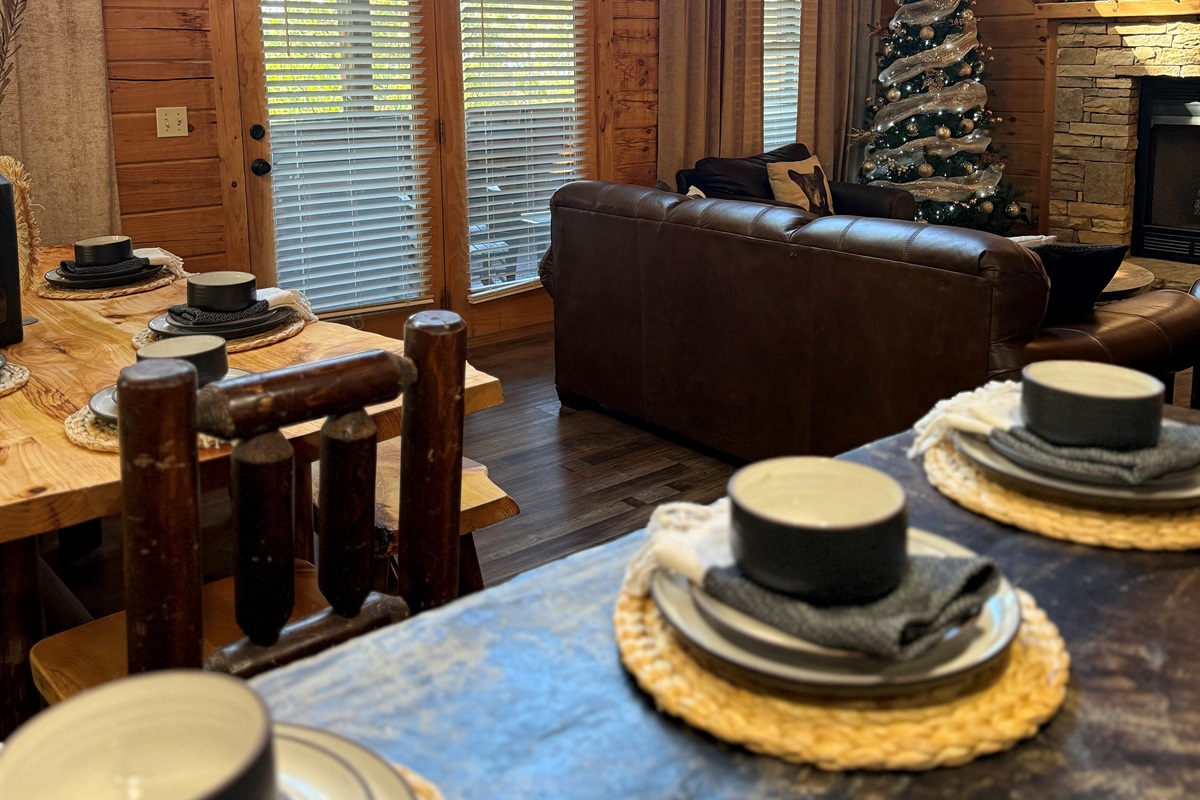 Set for festive dinners—cozy cabin glow for your holiday stay.