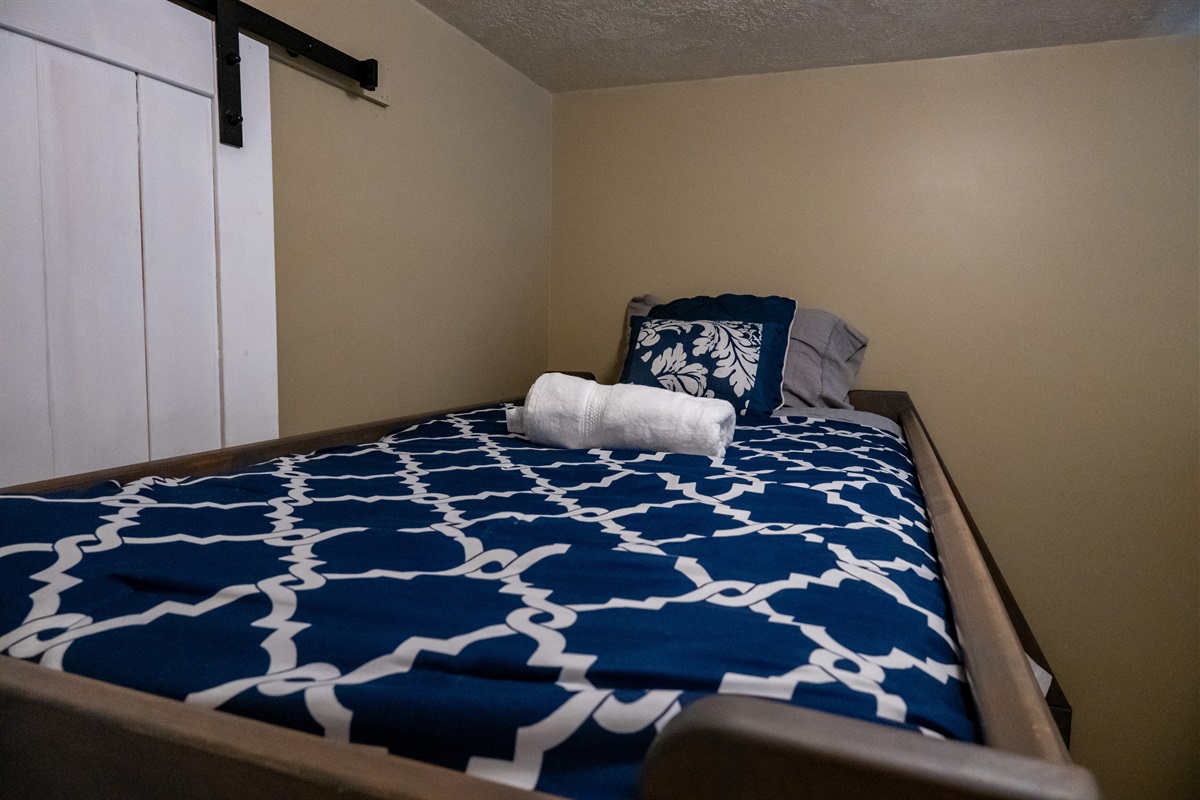 Additional sleeping space with plush bedding, perfect for families or groups.