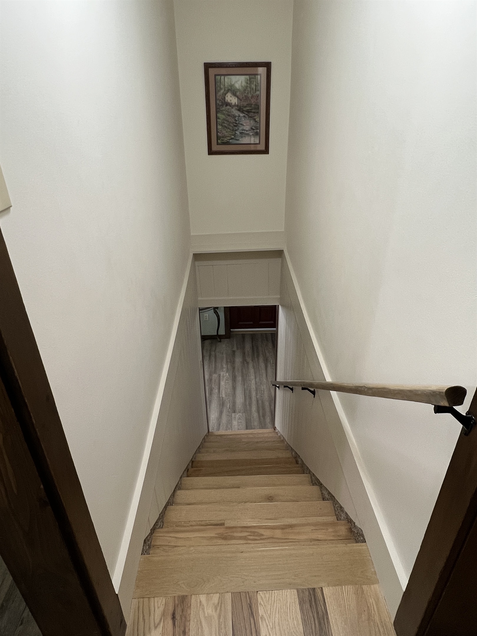 Roundtripper stairs to 2nd floor, looking down from the 2nd floor. note all new flooring throughout!