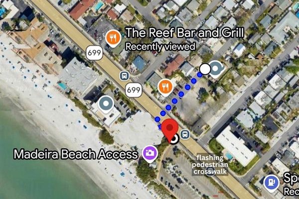 About a 2–3 minute walk to the beach access. A nearby flashing pedestrian crosswalk makes crossing Gulf Blvd easy and safe. Beach access includes restrooms and a rinse station.