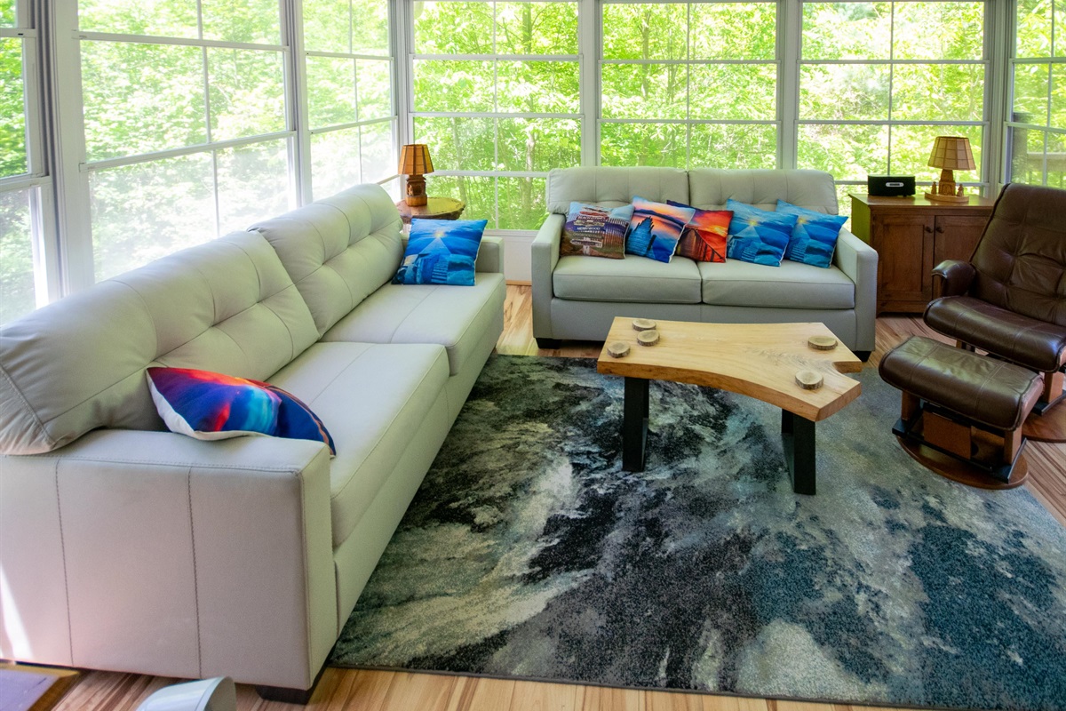 Enjoy the outdoors in comfort from the screened sunroom