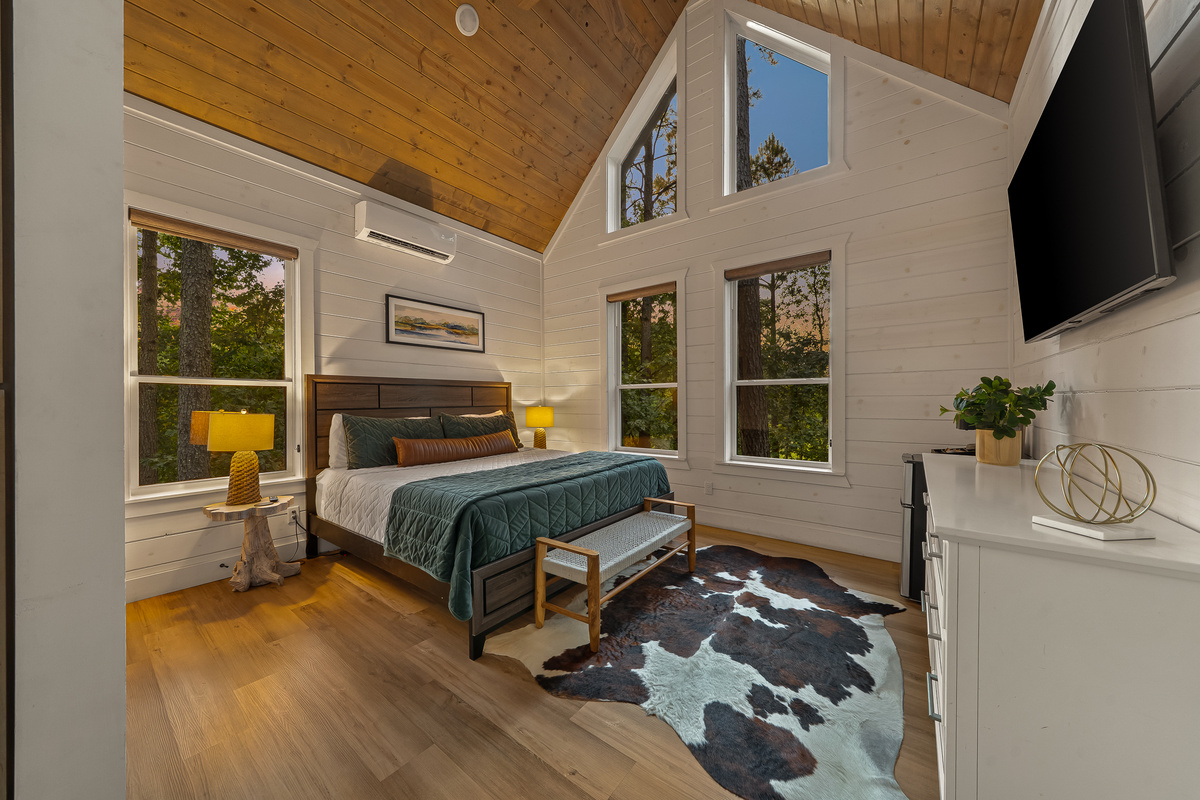 Wake up surrounded by trees in one of two private king pods designed as a quiet escape from the activity of the main house.