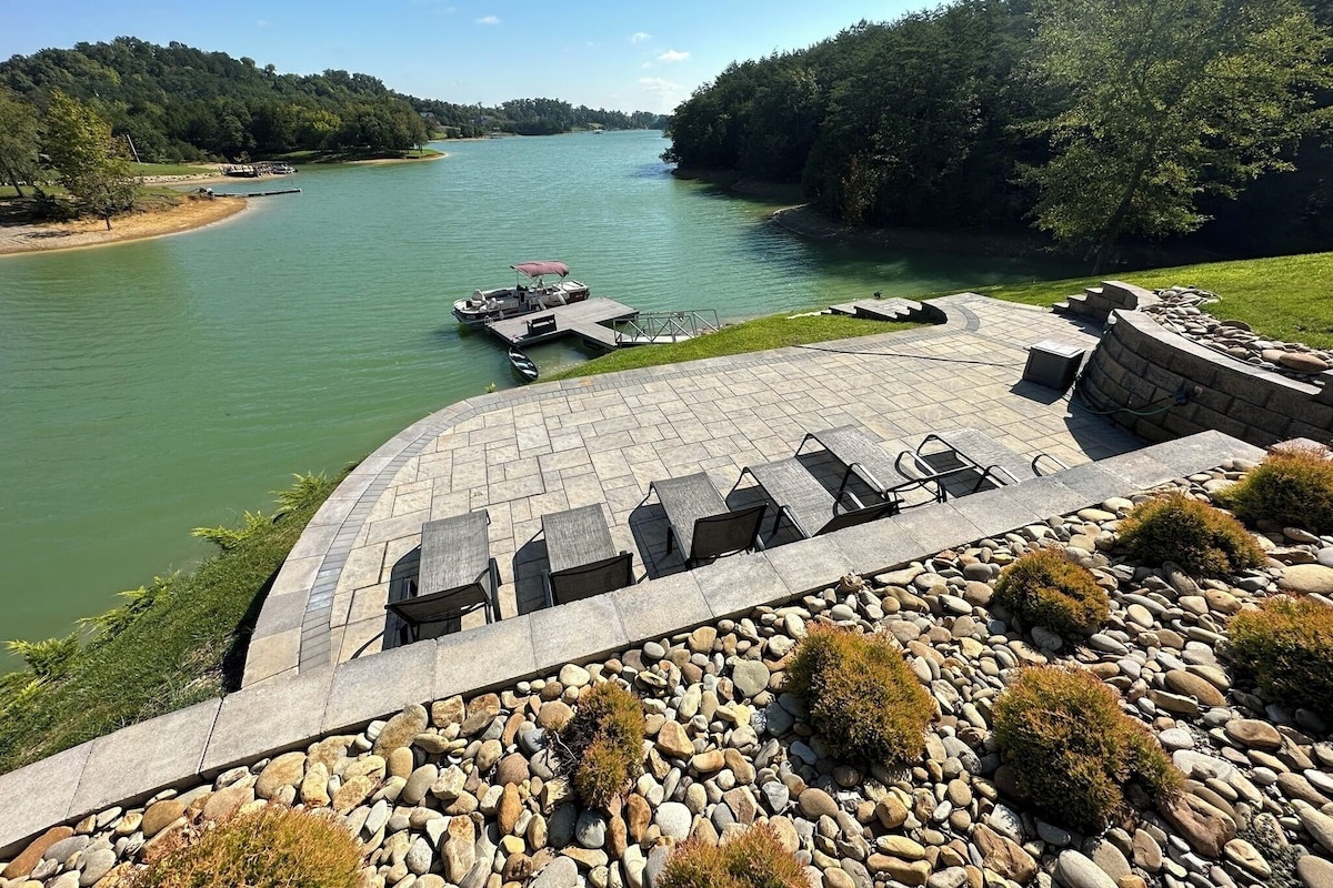 Bottom Patio takes you to wide stable steps down to the dock