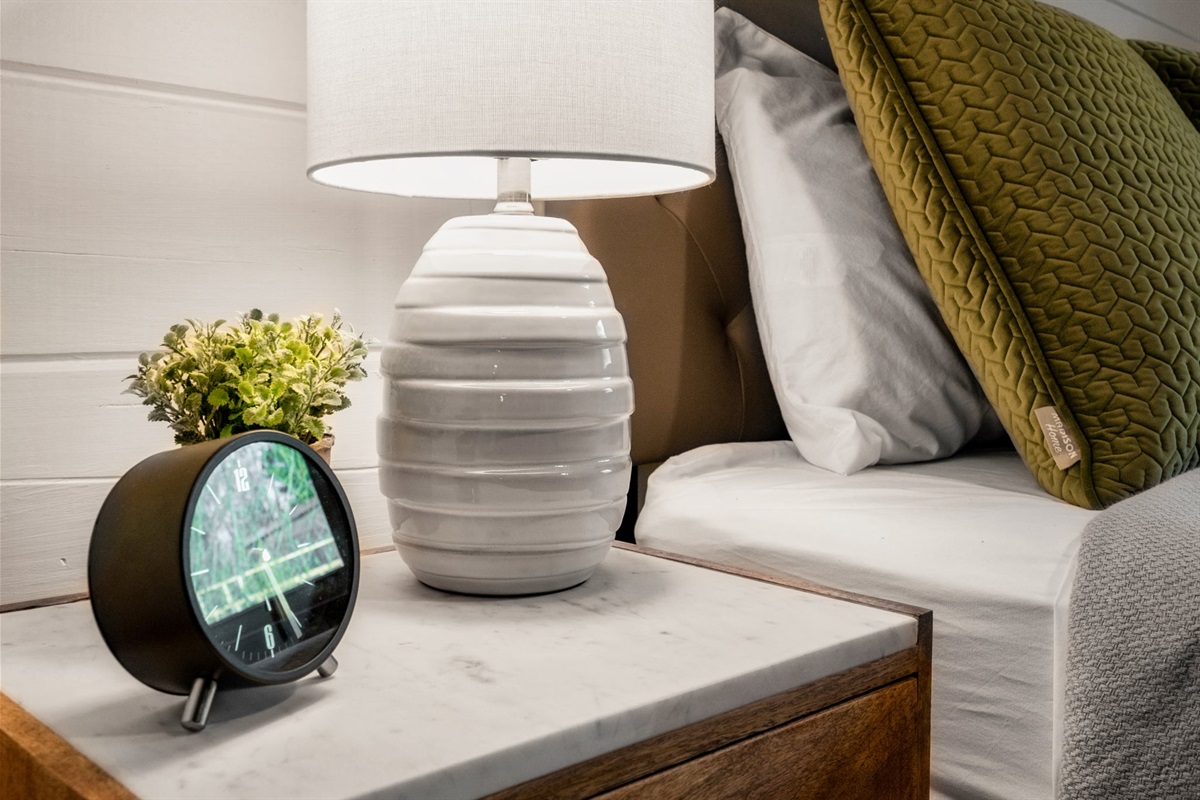 Elevate your stay with thoughtful details like our stylish bedside table, perfect for keeping your essentials within reach as you unwind and relax.