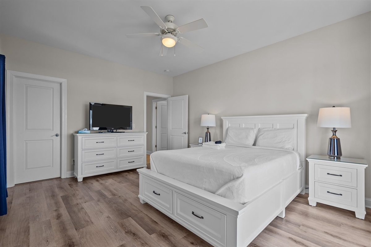 3rd floor queen bedroom #5 with smart TV, balcony access, intracoastal waterway views
