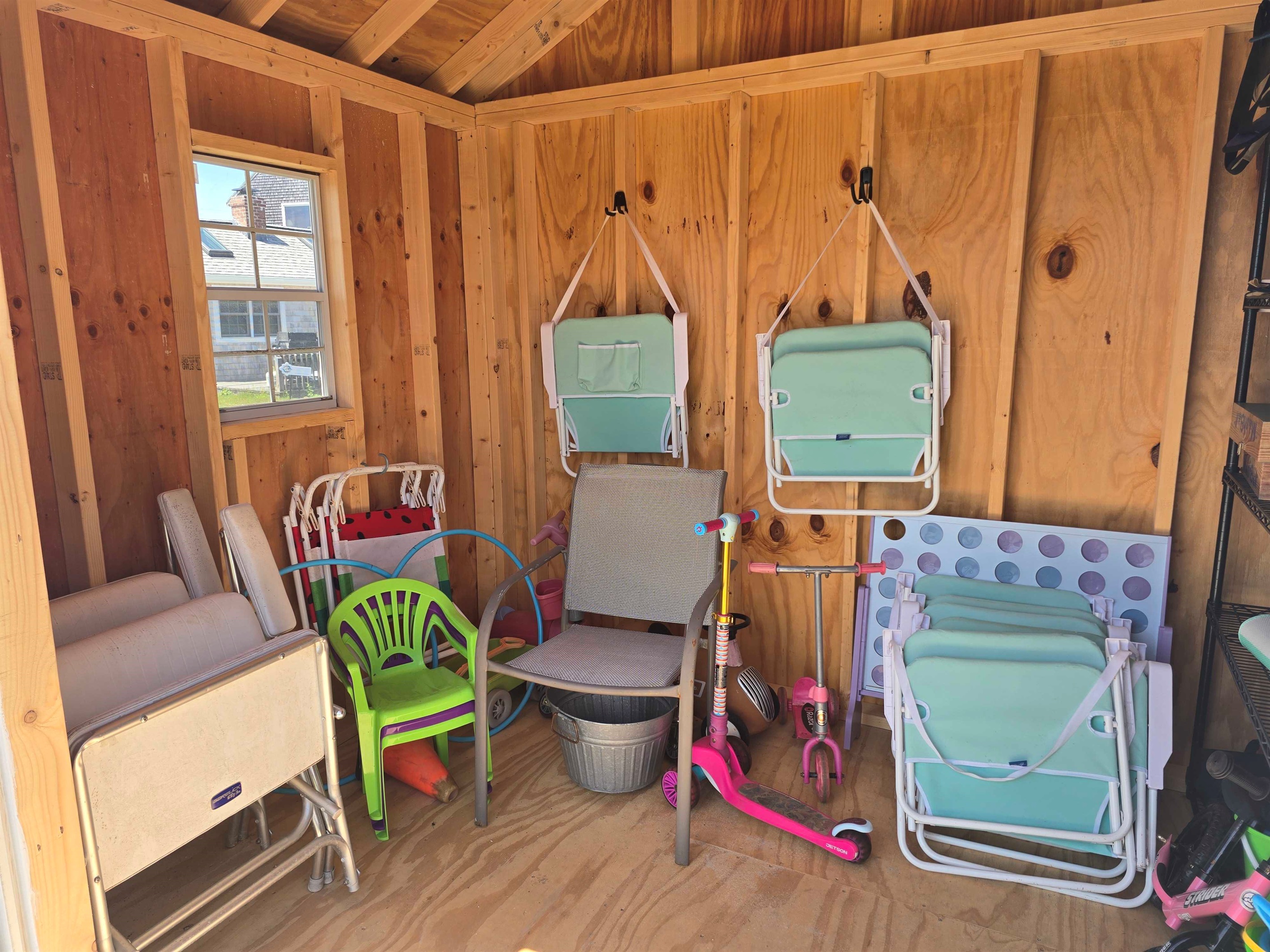 Grab beach chairs and toys anytime from the shed! Just don't forget to bring them back inside the shed!