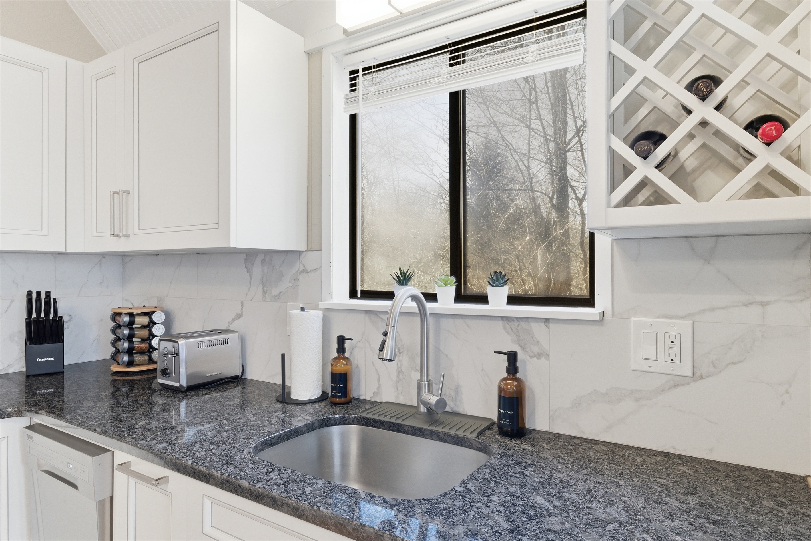 Kitchen with stainless steel appliances and granite countertops