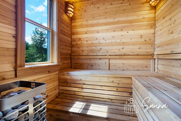 Enjoy a warm, relaxing session in this cedar sauna, perfect after a day of exploring the mountains.