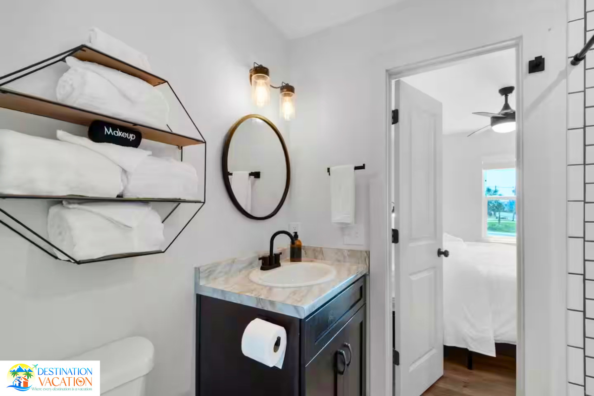 Stylish bathroom combines modern finishes with coastal character.