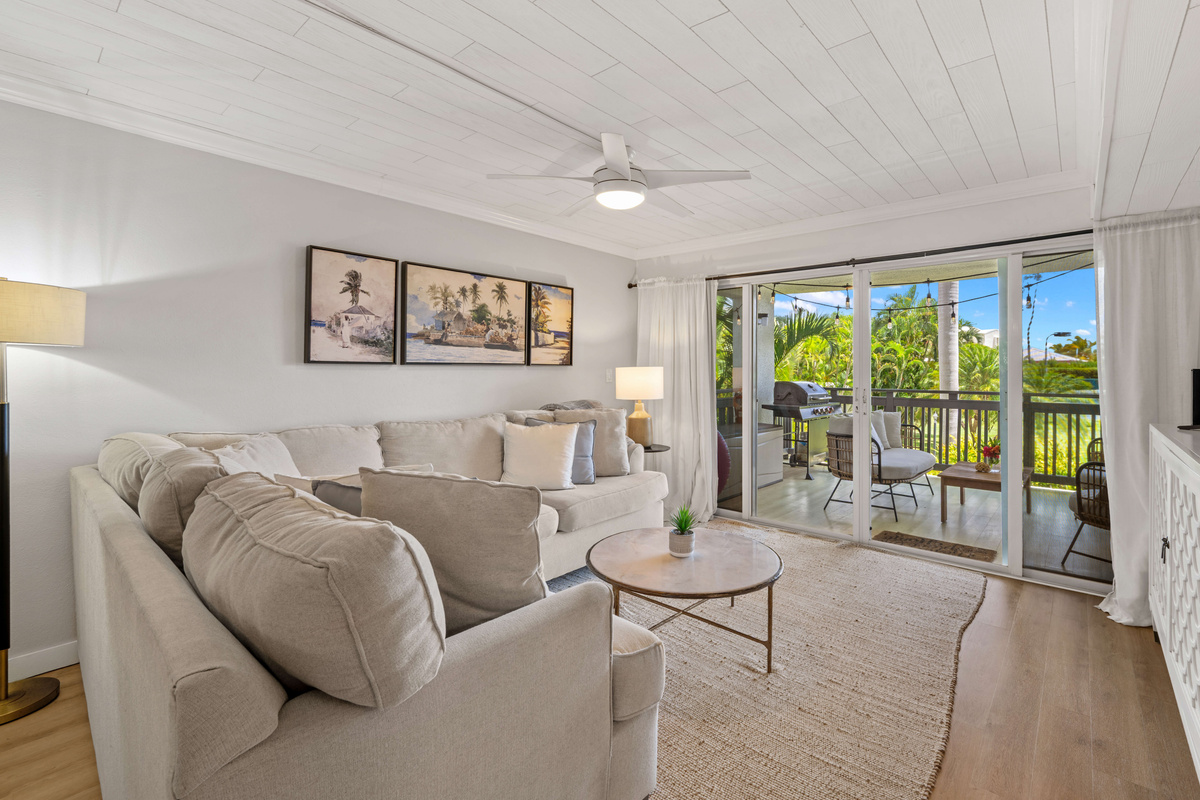 Stretch out and relax on the spacious sofa after a day in paradise.