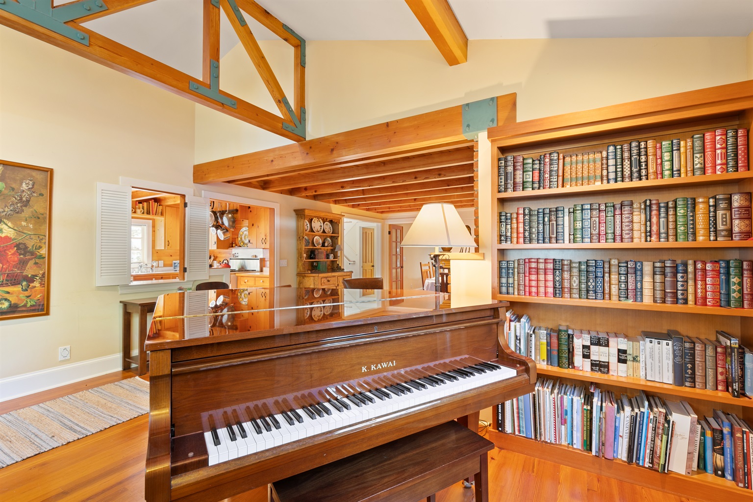 Grand piano and extensive library at center of the home