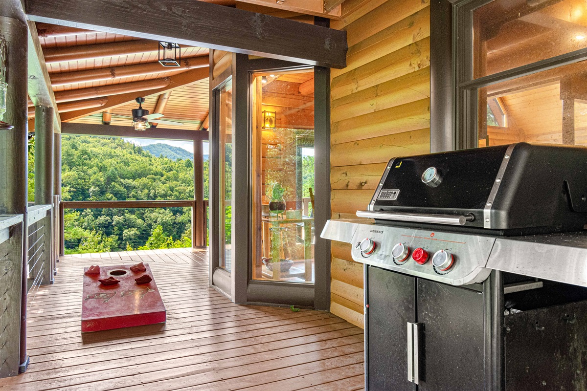 Main Level Deck: Sizzle up dinner on the grill with breathtaking mountain views and game night fun!