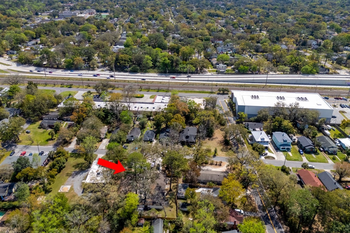 Aerial view showing the unit’s tree-lined setting