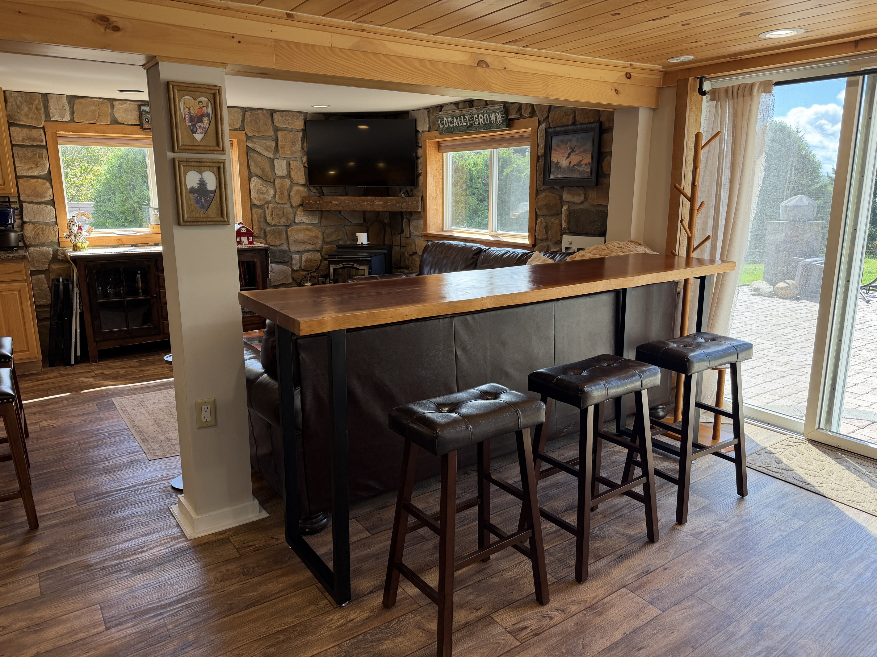 Bar seating behind the couch for snacking and cheering on your team
