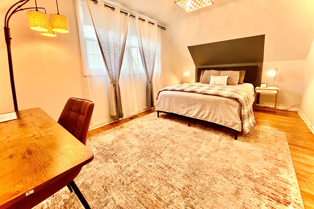 Upper Queen bedroom with office desk and chair 