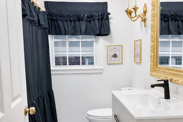 Full Bathroom overview, towels are  located under this sink cabinet inside of black bins
