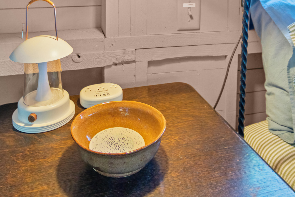 Thoughtful bedside touches include reading lamps and convenient charging stations, so your devices are ready for tomorrow's adventures.