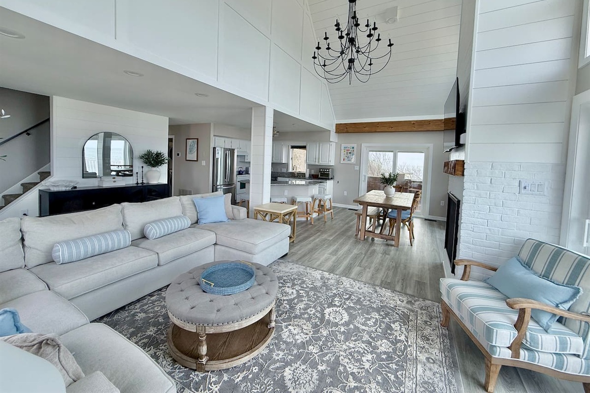 Relax in this airy, coastal-inspired living space. Designed with comfort in mind, it is the perfect retreat for friends and family to gather, unwind, and enjoy a memorable vacation together.
