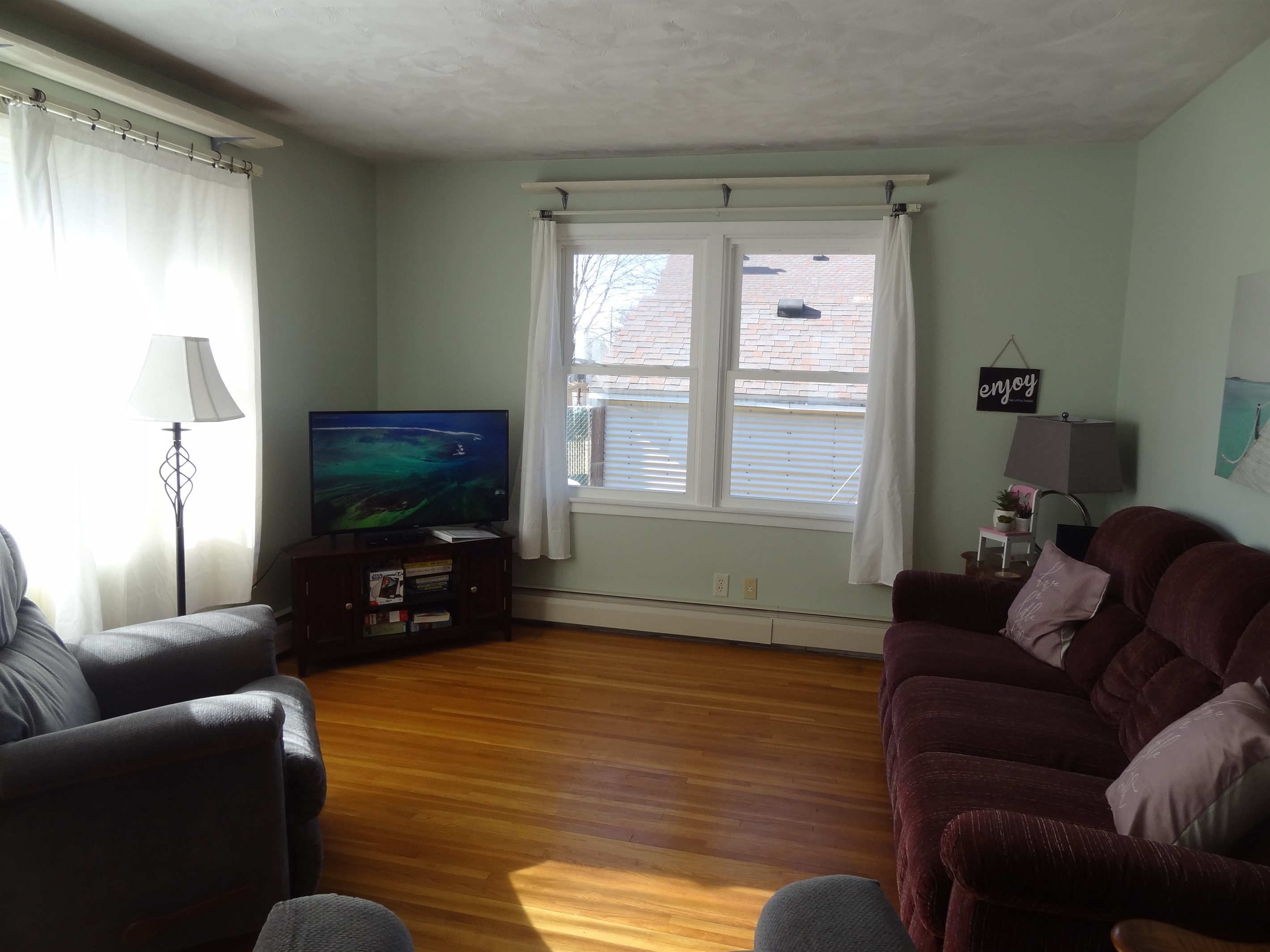 Full size couch, 2 recliners, Roku smart TV, laptop work space