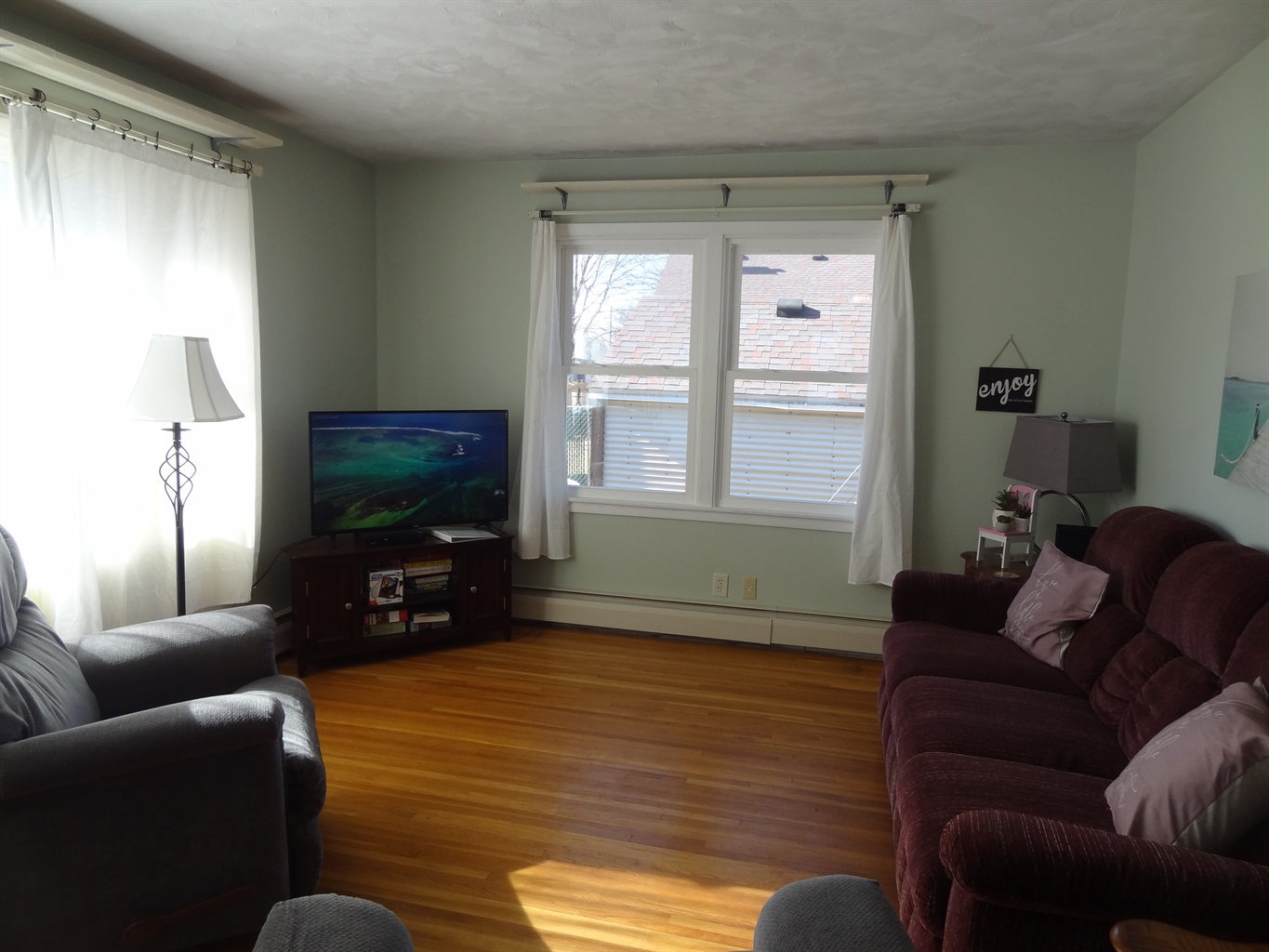 Full size couch, 2 recliners, Roku smart TV, laptop work space