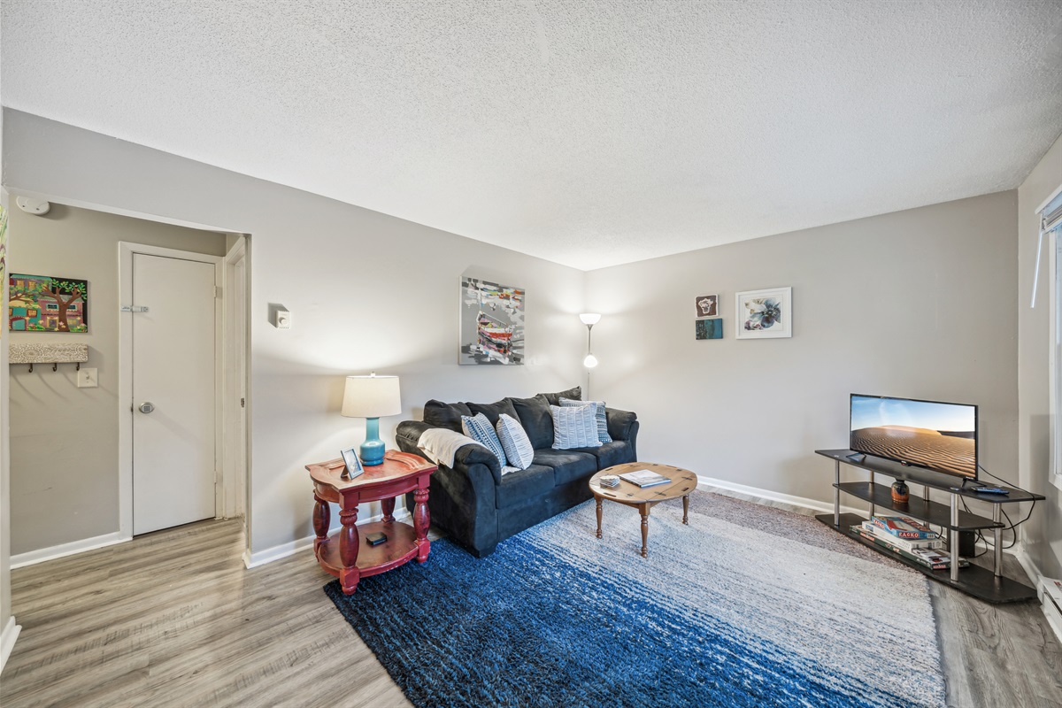 The upstairs living room overlooks the charming Stillwater neighborhood.