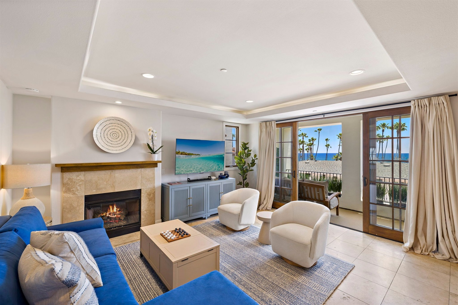 The best of both worlds - this condo is steps from the San Clemente main beach and short walk (or trolley ride) to the village.  The living room has lots of comfortable seating, views and natural light pouring in from the balcony.