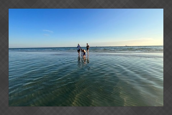 Enjoying the shallow beaches just a few blocks away