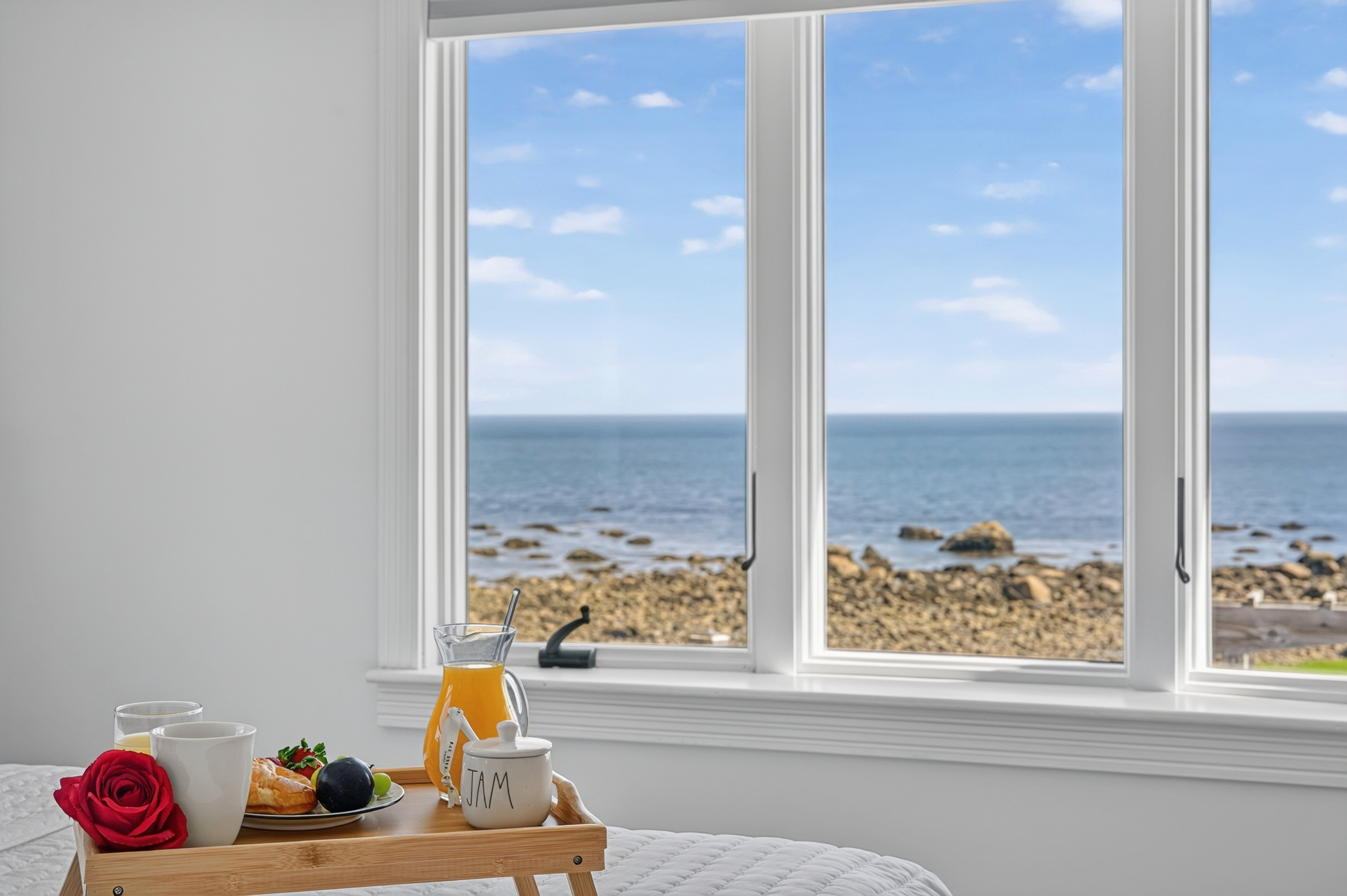 Start your morning with coffee and an unobstructed view of the ocean from inside the home.