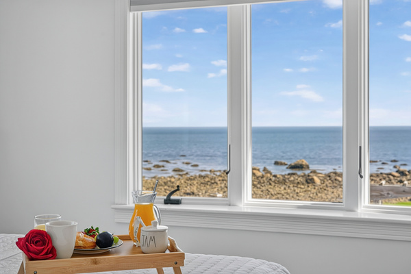 Start your morning with coffee and an unobstructed view of the ocean from inside the home.