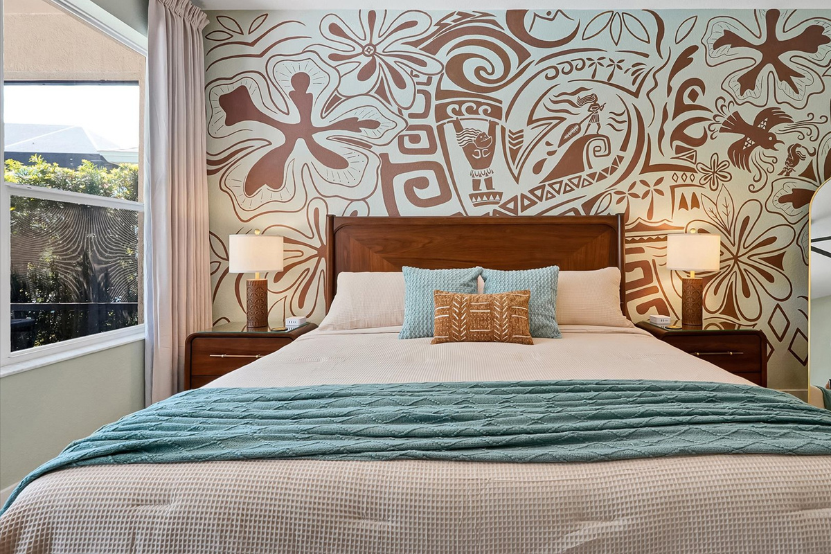 Moana King Suite: Spacious main-floor king retreat with direct access to its private ensuite bathroom.