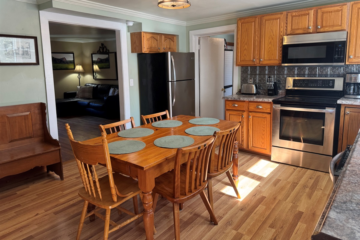 Kitchen with living room beyond