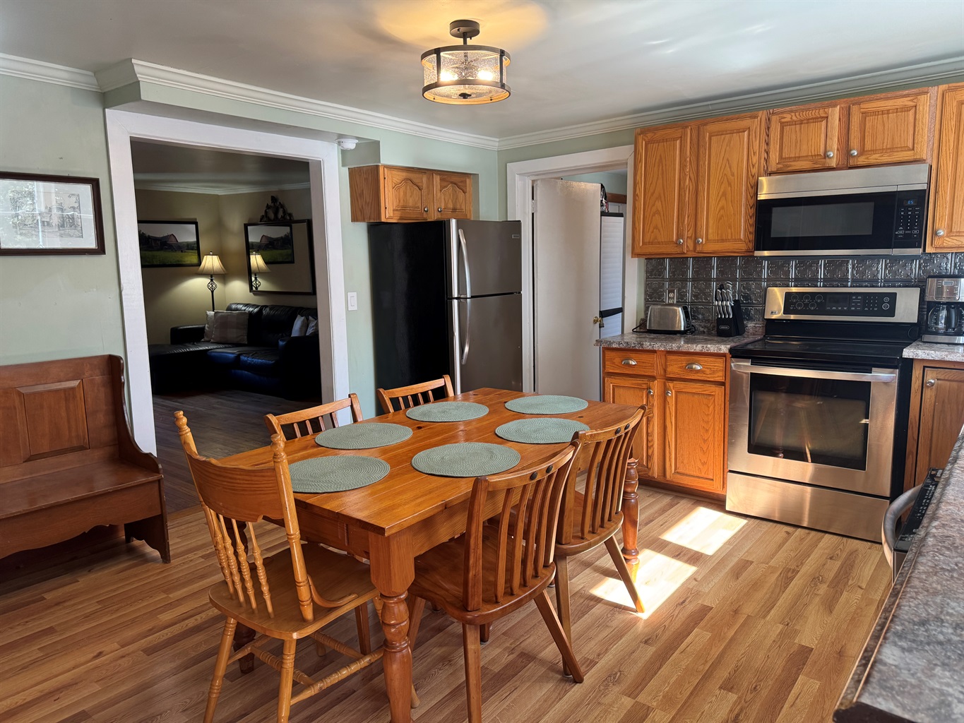 Kitchen with living room beyond